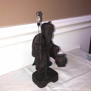 Vintage hardwood Asian fisherman statuette